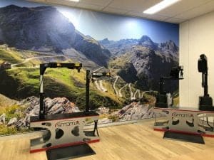 Total Ability showroom with Stelvio mountain scene burial on background wall