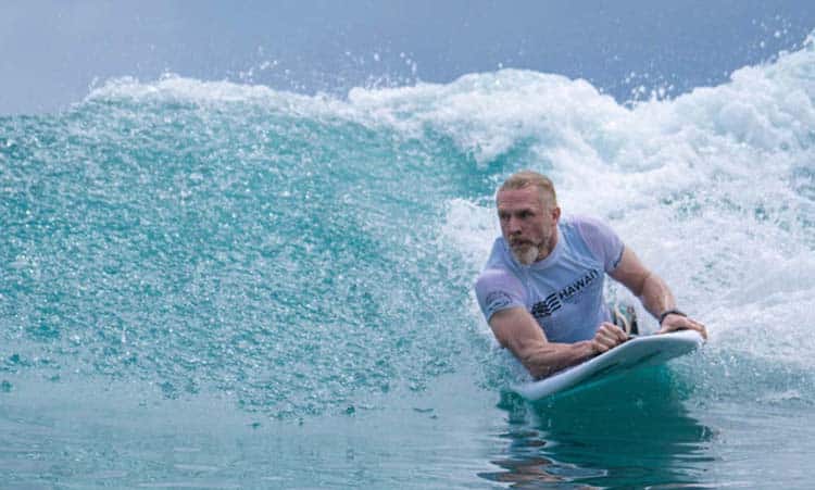 Chris surfing in Hawaii