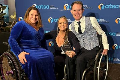 Total Ability's Frankie Britt, winner of 2025 ATSA Award for AT Product Consultant of the Year, pictured centre with Michelina Pelosi (left) and Paul Crake (right)